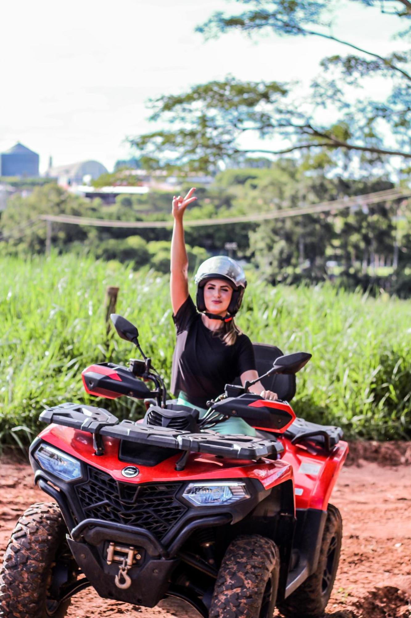 Blue Tree Thermas De Lins Resort Eksteriør bilde A woman on a quad bike